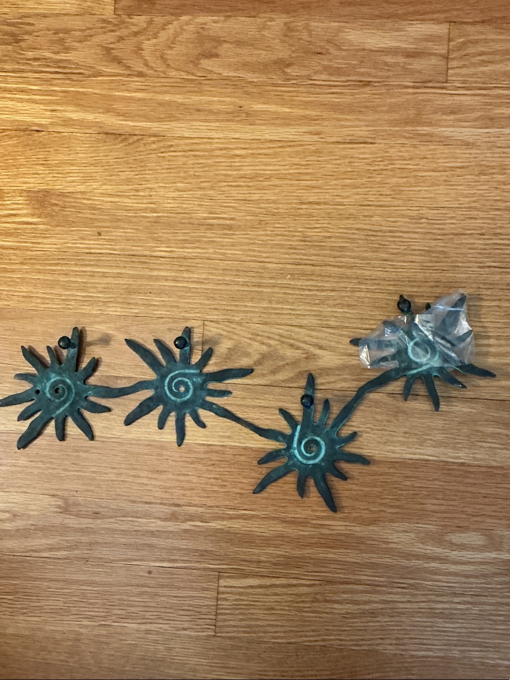 SPI San Pacific Int'l Decorative Metal coat hanger Starburst - Green Patina